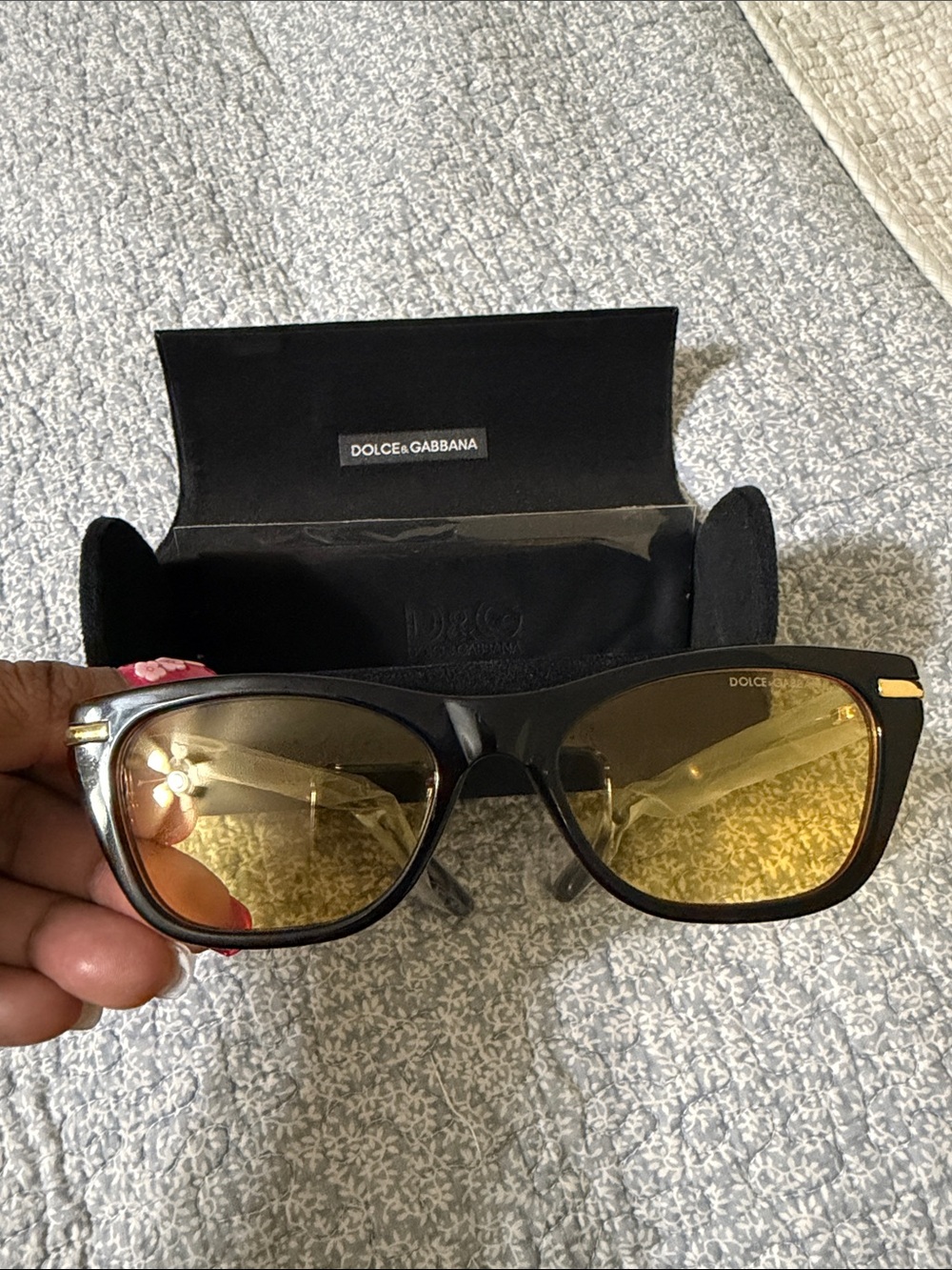 Dolce & Gabbana Black Frame Sunglasses with Amber-Yellow Lenses